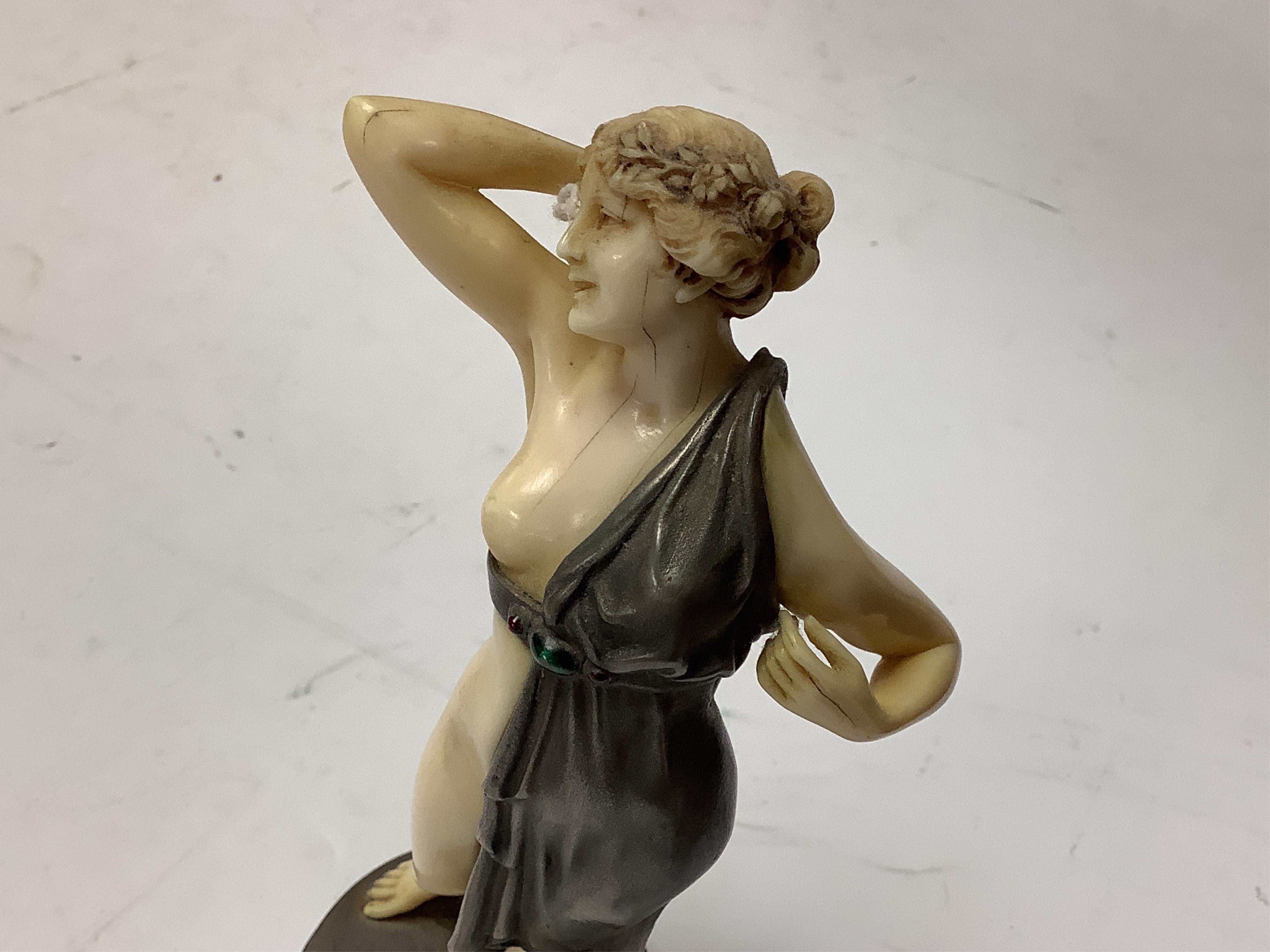 After F. Preiss, an Art Deco style silvered metal and ivorine figure, 'Vanity', 22cm high